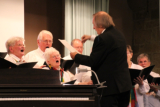 Gemischter Chor mit Dirigent Rainer Koppenhöfer